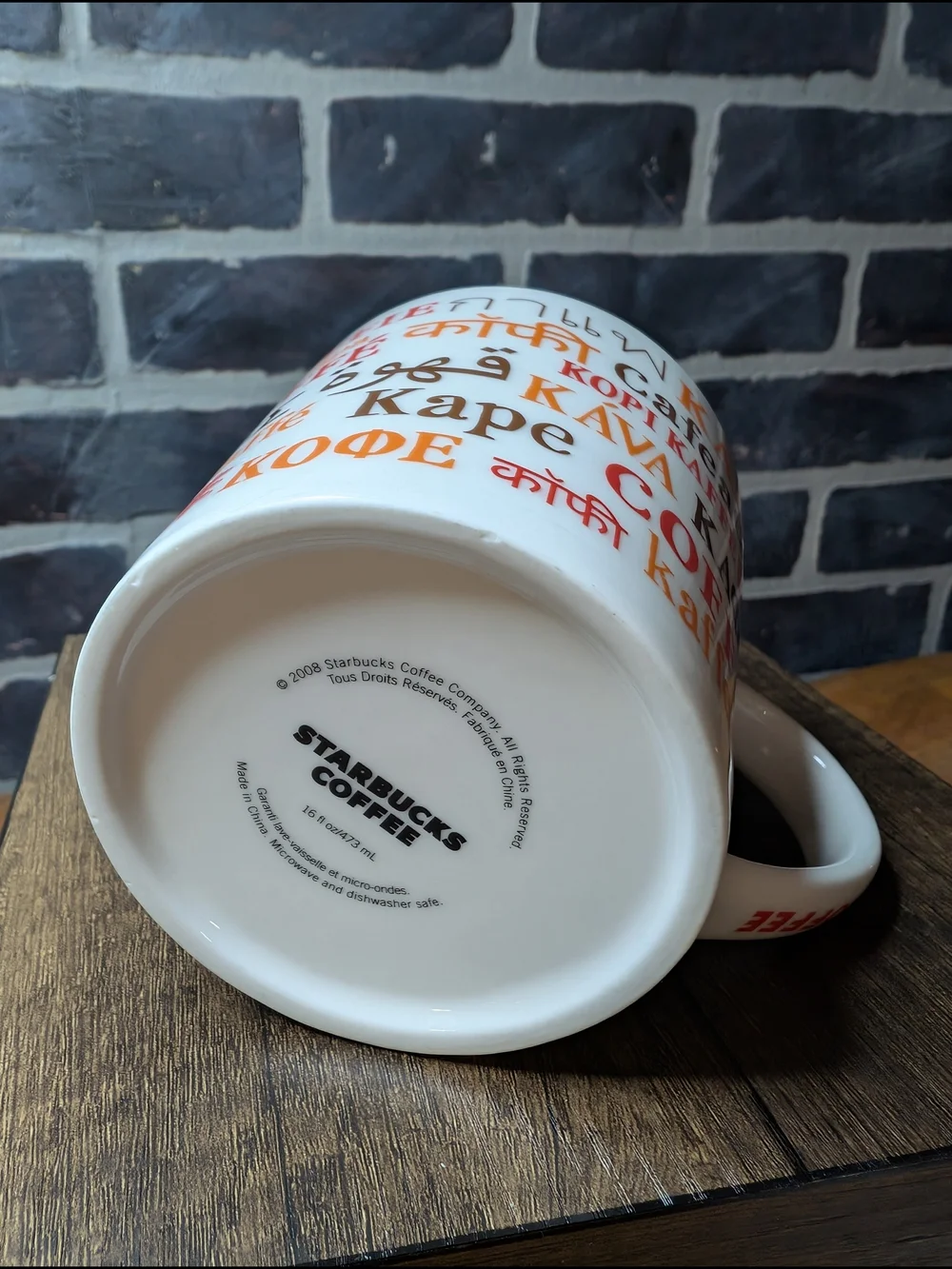 White and Red Coffee Mug with Multilingual 'Coffee' Design